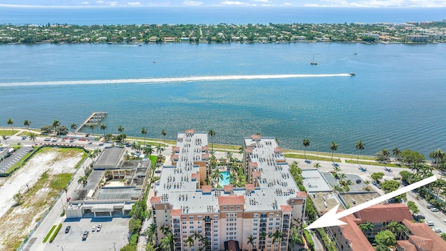 birds eye view of property featuring a water view