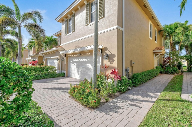 view of home's exterior with a garage