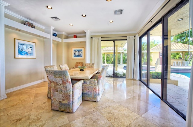 dining area with crown molding