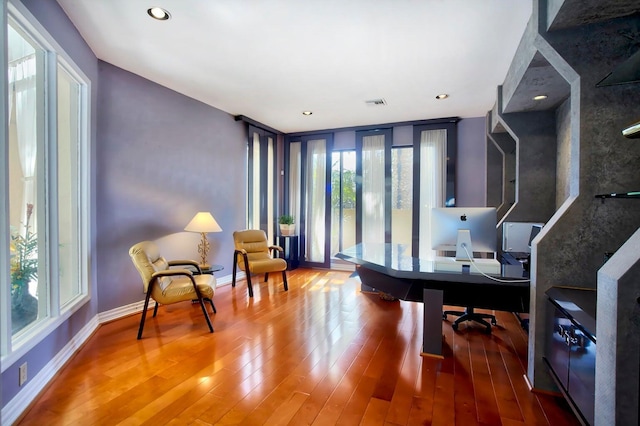 office area with hardwood / wood-style flooring