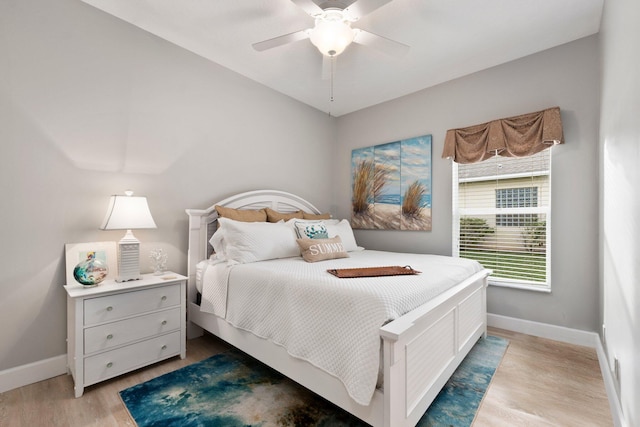 bedroom featuring ceiling fan and light wood-type flooring