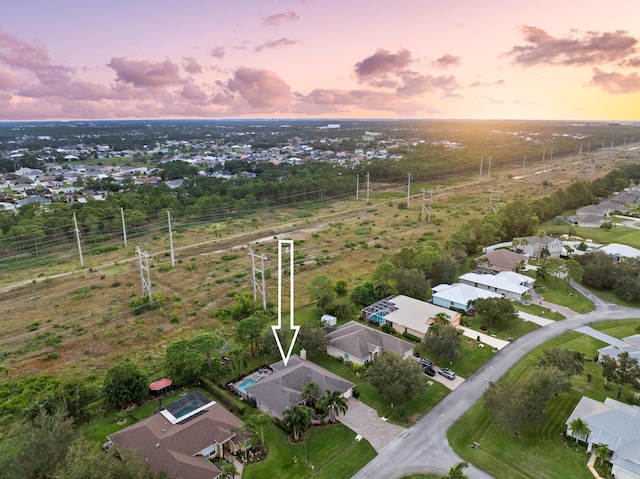 view of aerial view at dusk