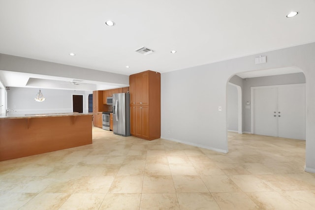 unfurnished living room with sink