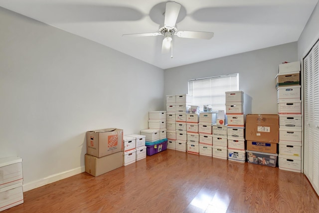 interior space featuring ceiling fan