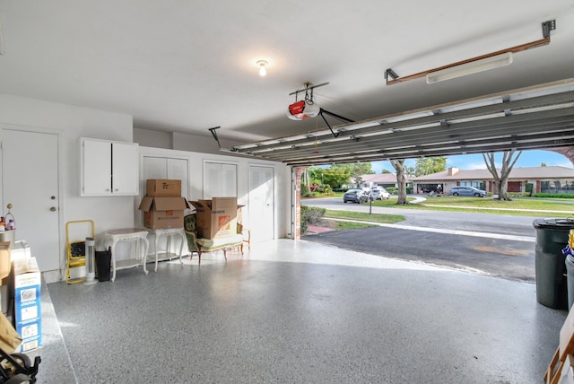 garage featuring a garage door opener