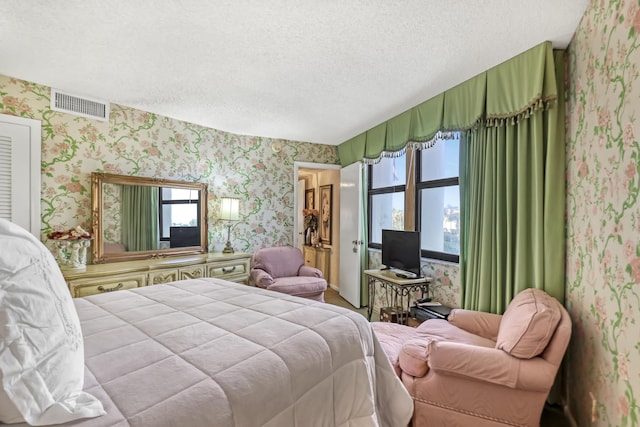 bedroom with a textured ceiling