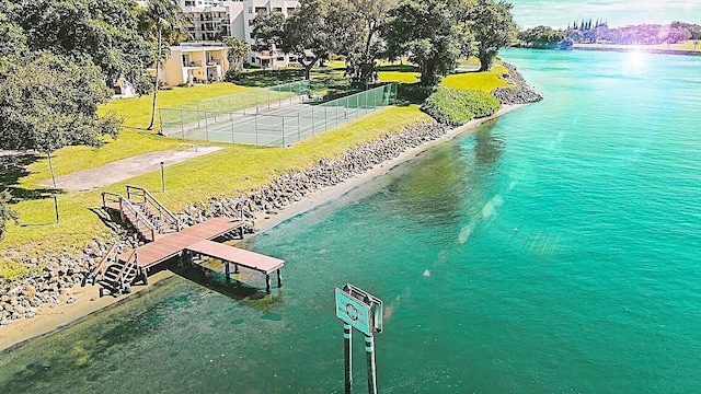 drone / aerial view featuring a view of the beach and a water view