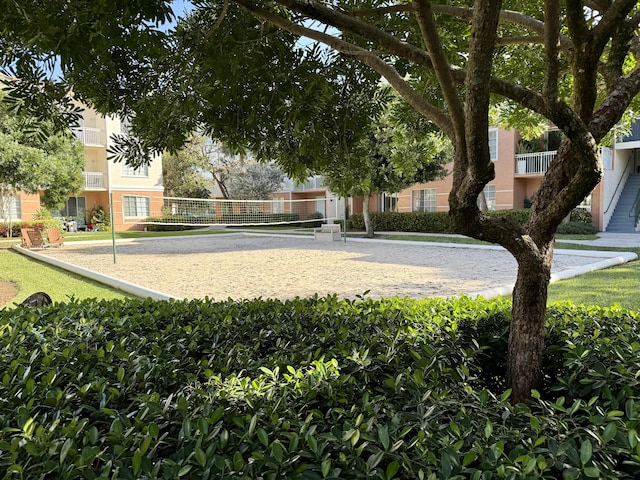 view of community featuring volleyball court