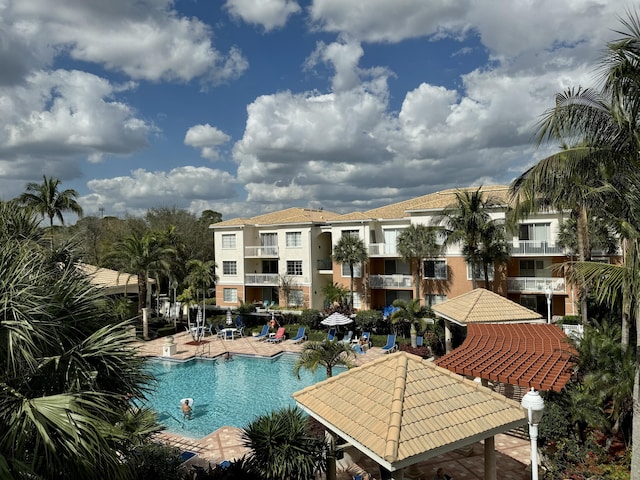 view of swimming pool featuring a gazebo and a patio area