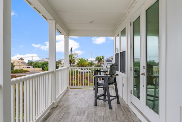 balcony featuring french doors