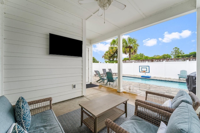 view of patio / terrace featuring an outdoor living space and a fenced in pool