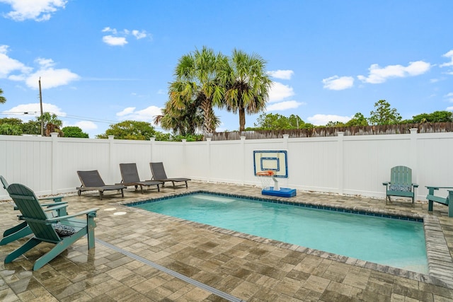 view of swimming pool featuring a patio