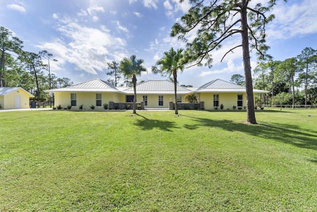 exterior space with a front lawn