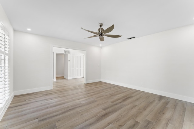 unfurnished room featuring light hardwood / wood-style flooring and ceiling fan