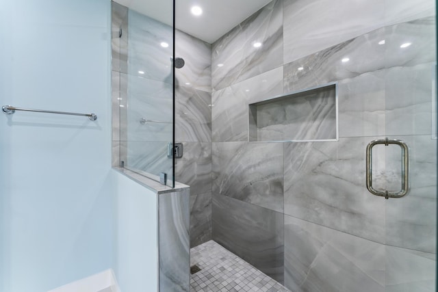 bathroom with an enclosed shower