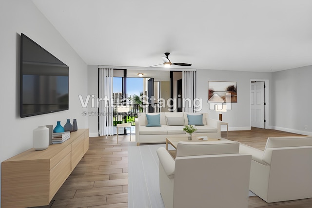 living room with hardwood / wood-style floors and ceiling fan