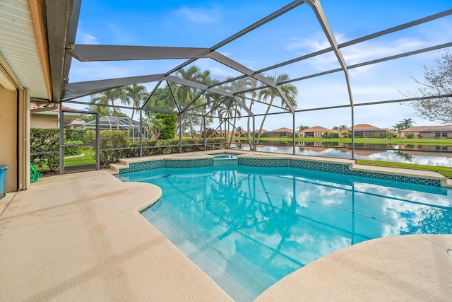 view of pool featuring a lanai, a patio area, an in ground hot tub, and a water view