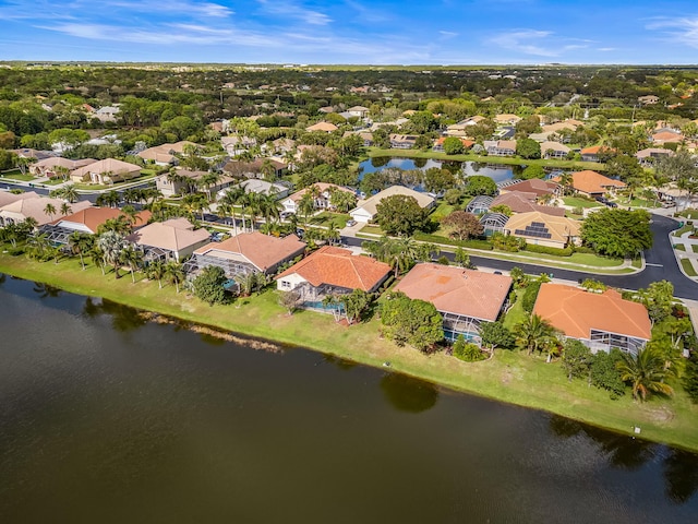 drone / aerial view with a water view