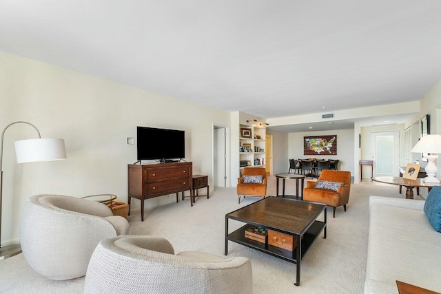 living room with light colored carpet