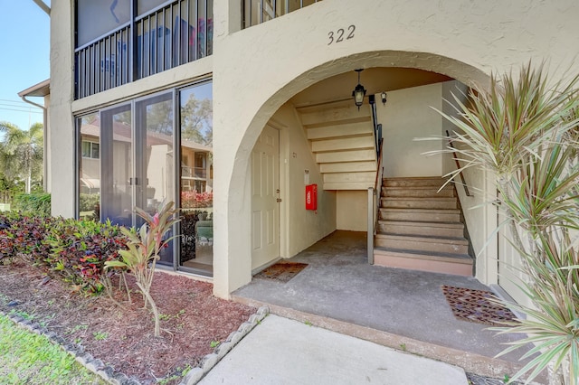 doorway to property featuring a balcony