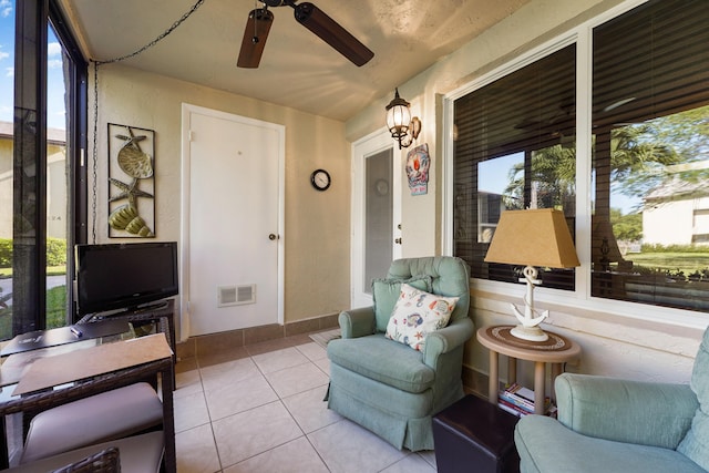 exterior space featuring ceiling fan