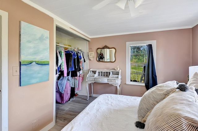 bedroom featuring a closet and ornamental molding