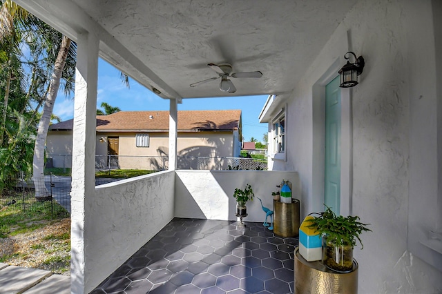 view of patio featuring ceiling fan