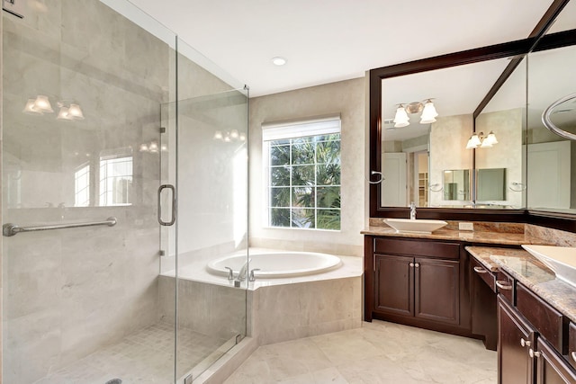 bathroom featuring vanity and plus walk in shower