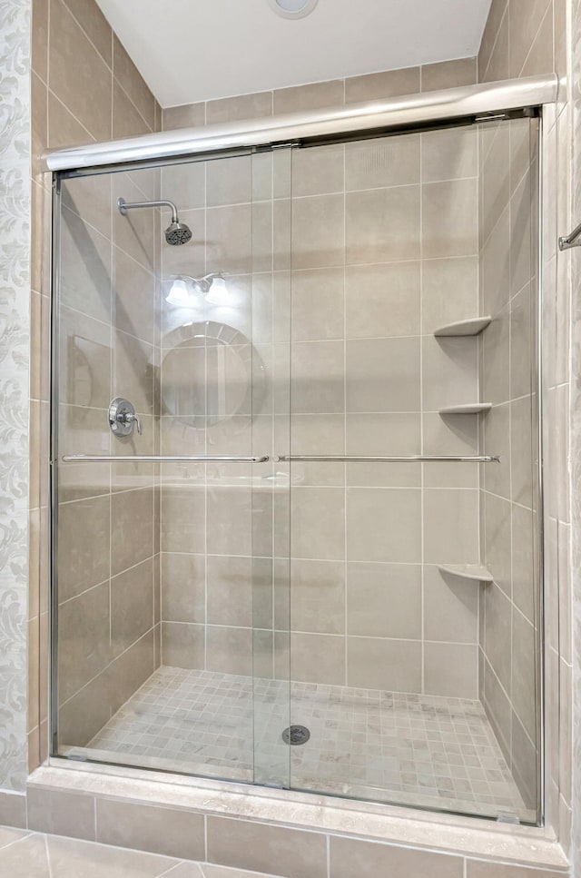 bathroom featuring walk in shower