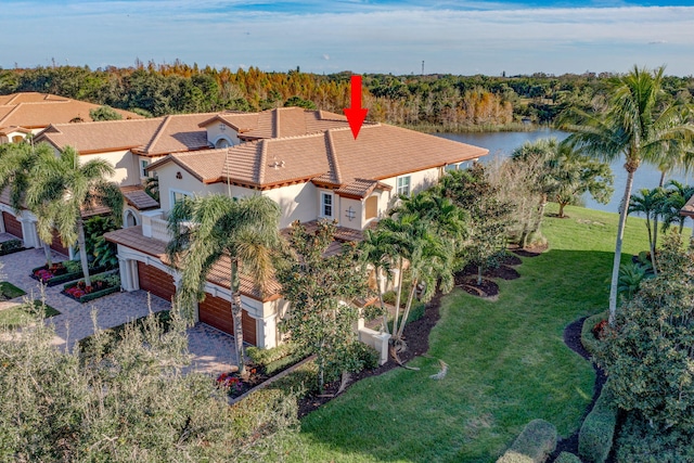 drone / aerial view with a water view