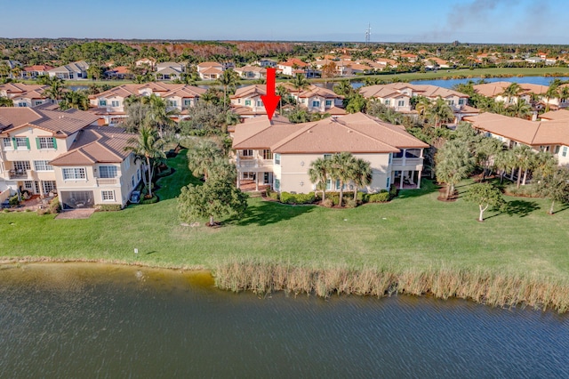 bird's eye view with a water view