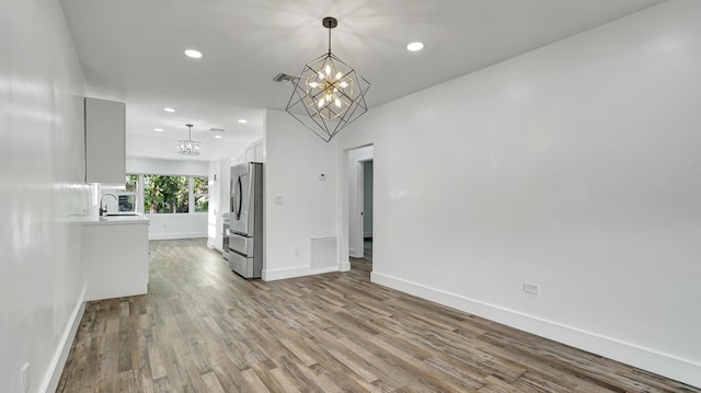 interior space featuring light wood-type flooring and sink