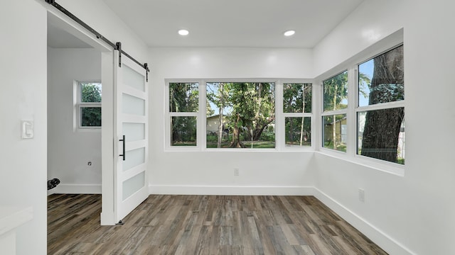 interior space featuring a barn door