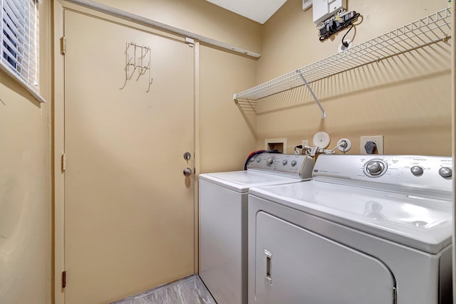 laundry area featuring independent washer and dryer