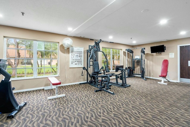 exercise room with carpet floors