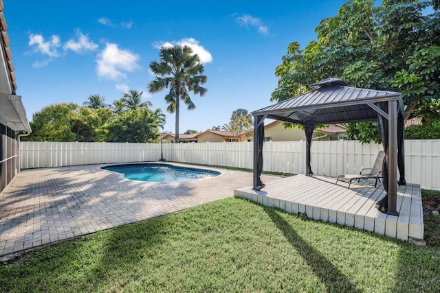 view of pool with a gazebo and a lawn