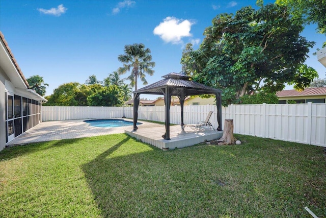 view of yard with a gazebo, a patio, and a fenced in pool