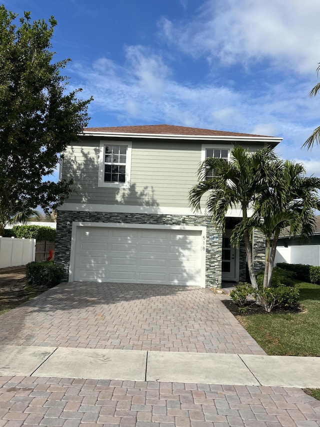 view of front of home featuring a garage