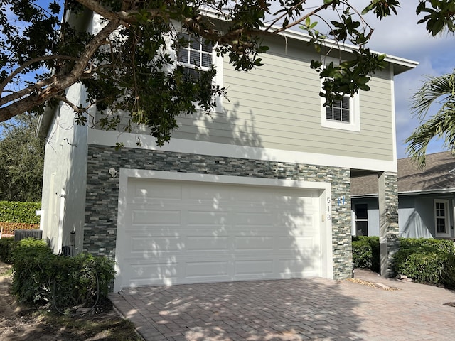 exterior space with a garage