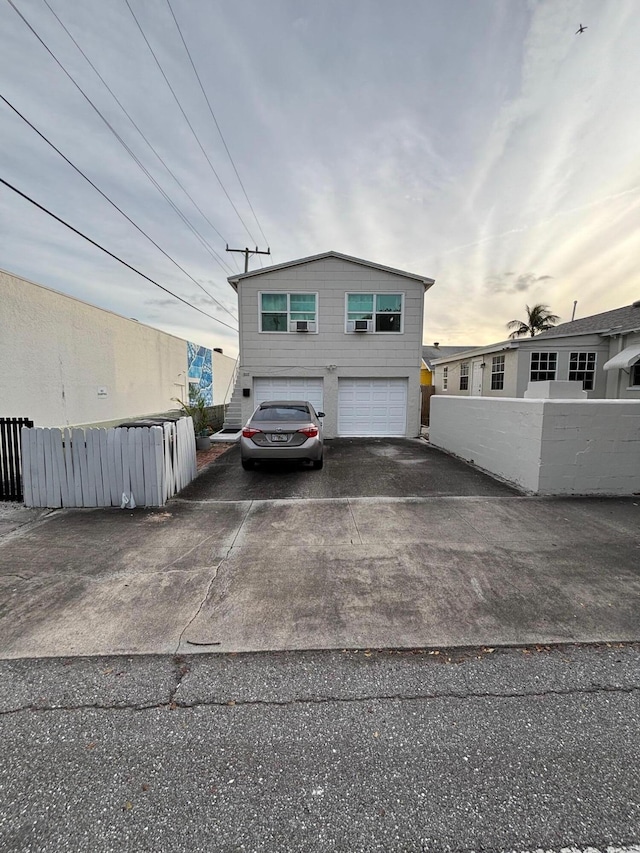 view of front of property featuring a garage