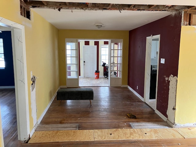 entryway with hardwood / wood-style flooring