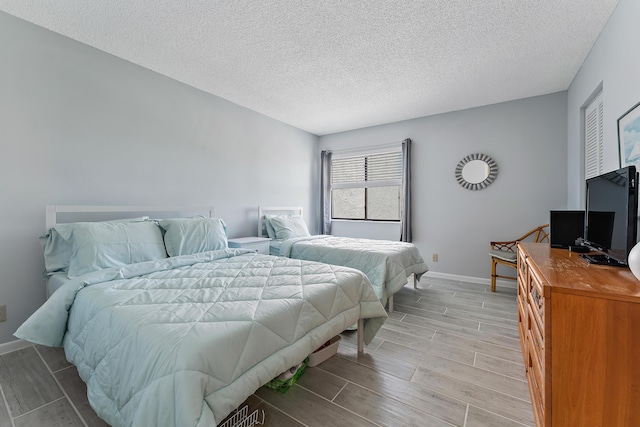 bedroom with a textured ceiling