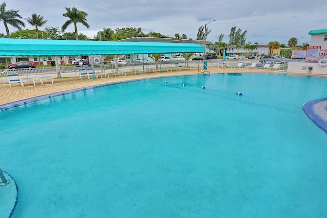 view of swimming pool with a patio area