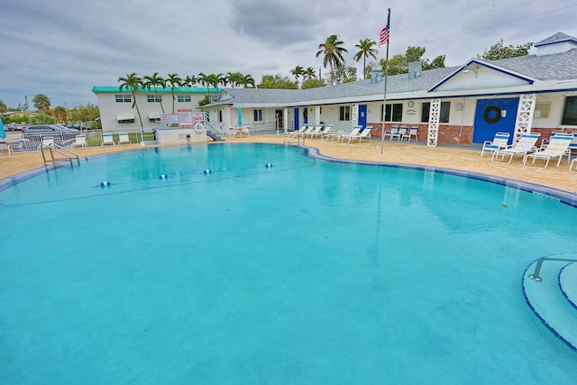 view of pool featuring a patio area