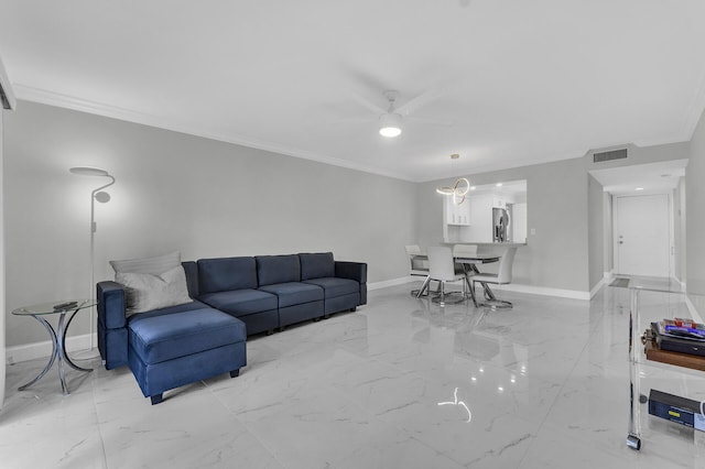 living room featuring ceiling fan and ornamental molding