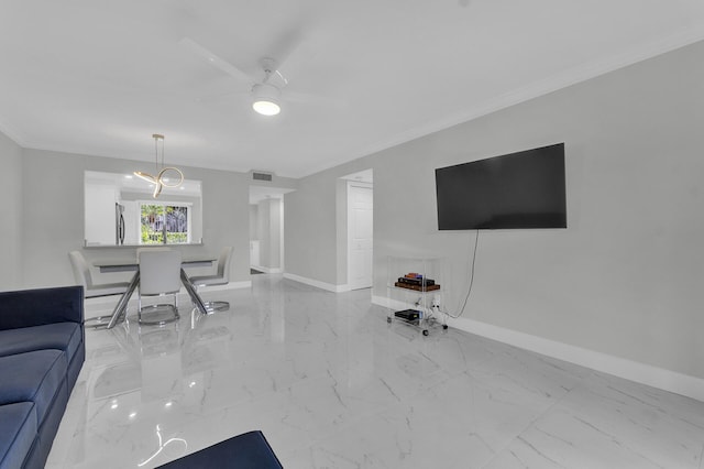 living room featuring ceiling fan and crown molding