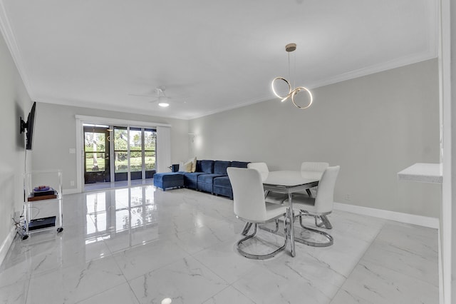 dining area featuring ceiling fan with notable chandelier and ornamental molding