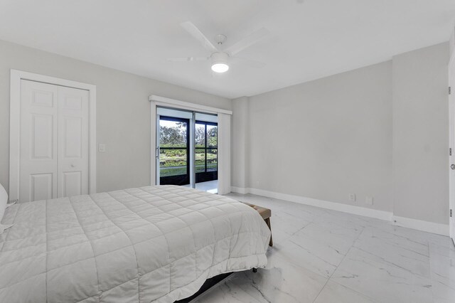 bedroom with access to exterior, ceiling fan, and a closet