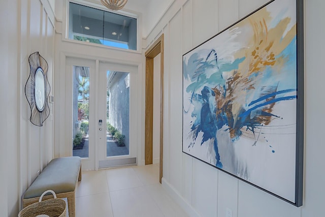 doorway featuring light tile patterned flooring