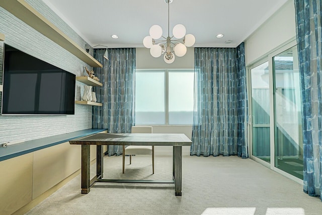 office area with light colored carpet and an inviting chandelier